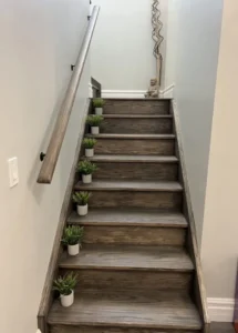 Secure and well-lit staircase leading to upper-level treatment rooms in Oshawa
