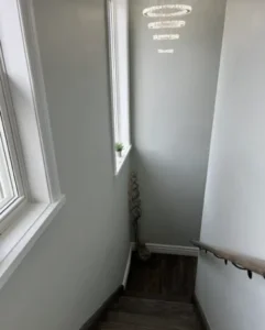 Polished stairs with non-slip grips for patient safety at CWR Clinics.