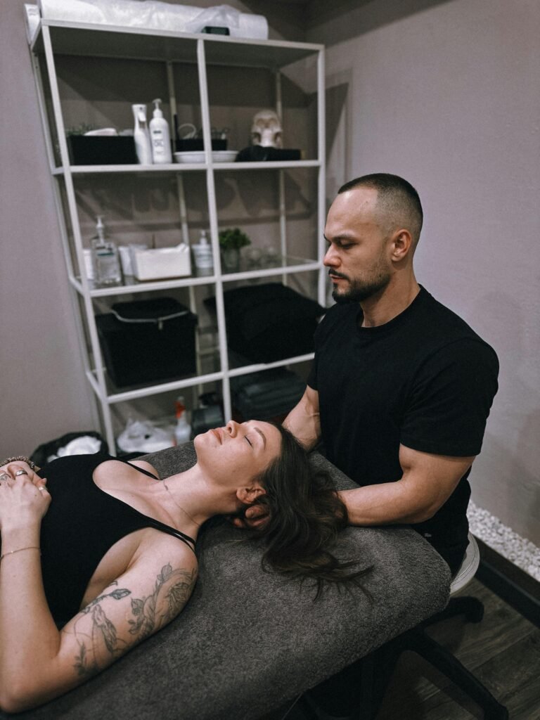 pexels-photo-30423033-30423033 A chiropractor provides therapy to a relaxed patient in a calming, indoor setting.