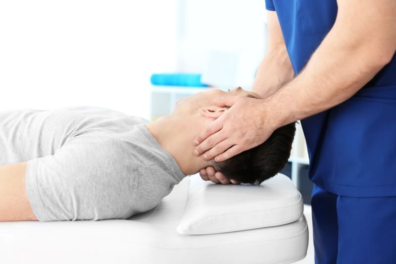 Cranial-osteopath-treating-a-patient