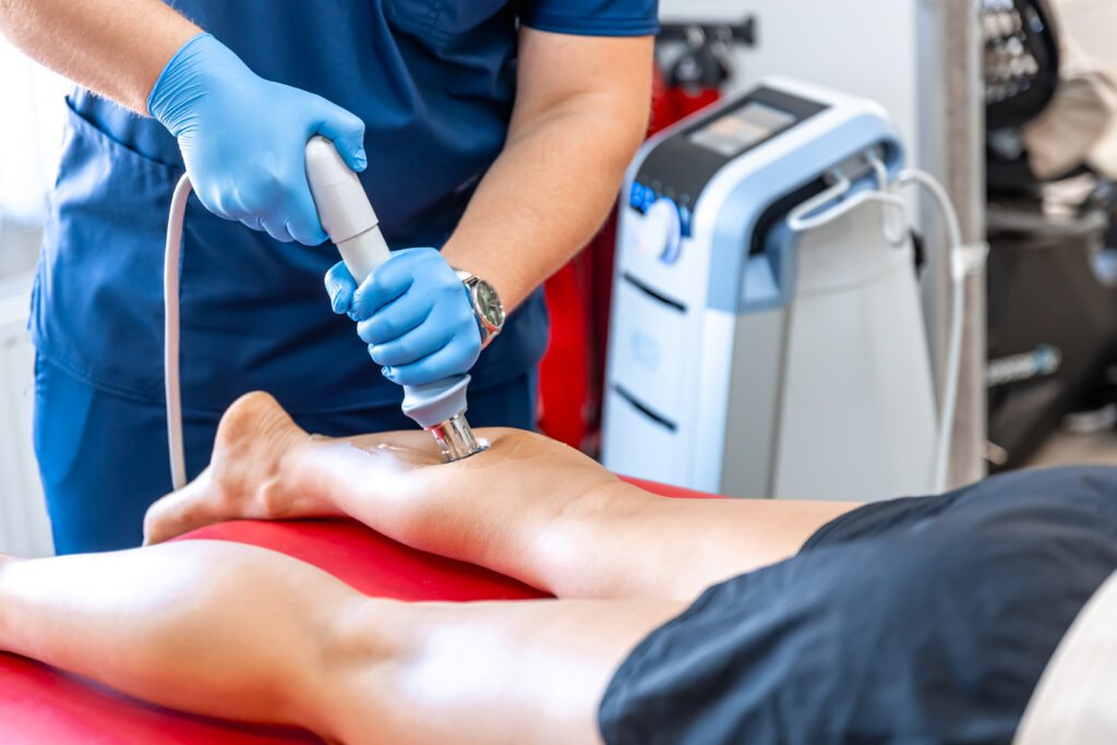 physical therapy of the shin with shock wave, extracorporeal shockwave therapy. physical therapy of the shin with shock wave, extracorporeal shockwave therapy.